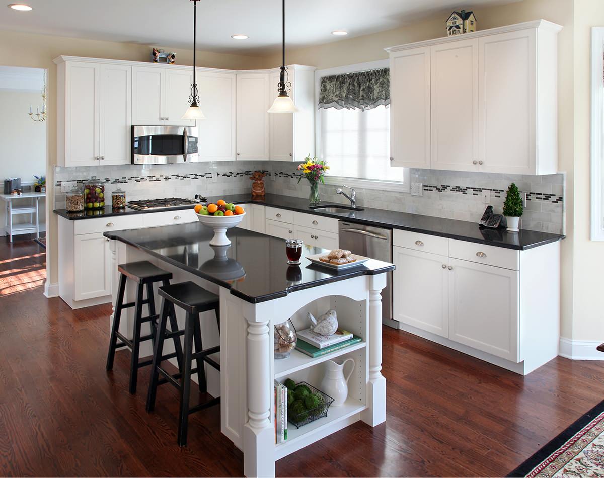 black quartz countertops white cabinets