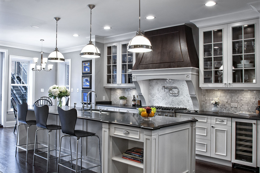 Trendy kitchen photo in Chicago with glass-front cabinets