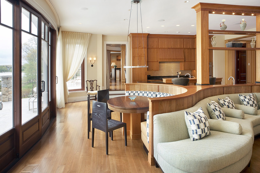 Kitchen - contemporary kitchen idea in Boston with flat-panel cabinets, medium tone wood cabinets and beige backsplash