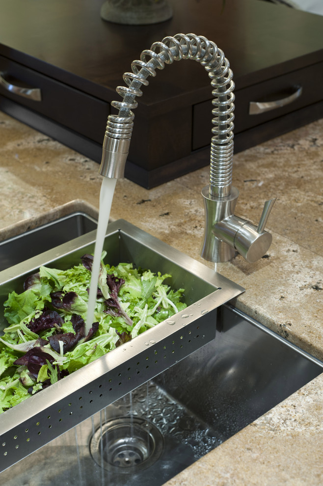 Eat-in kitchen - modern u-shaped eat-in kitchen idea in Vancouver with an undermount sink, flat-panel cabinets, dark wood cabinets and granite countertops