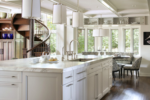 Elegant kitchen island showcasing the quality of Canadian RTA cabinets with marble countertop and modern lighting