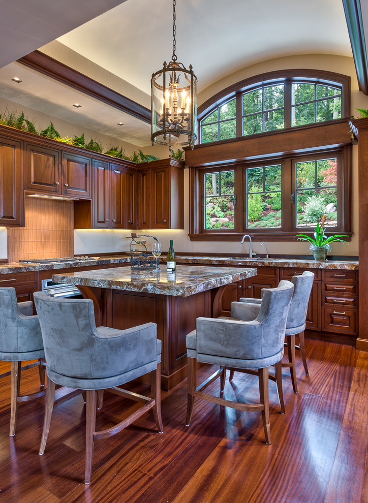 Example of a classic kitchen design in Other with an undermount sink, raised-panel cabinets, dark wood cabinets and beige backsplash