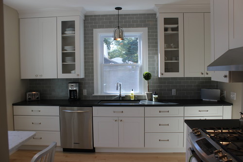 Transitional kitchen space featuring Absolute Black granite in a leathered finish