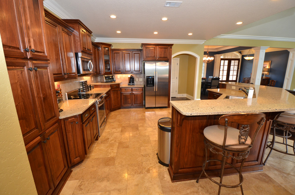 Example of an arts and crafts kitchen design in Atlanta