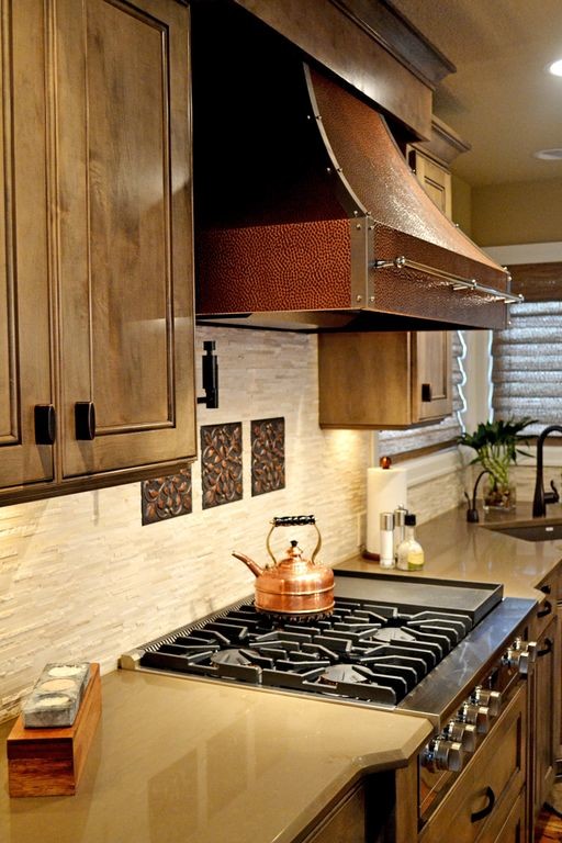 Inspiration for a contemporary kitchen in Portland with a built-in sink, beaded cabinets, distressed cabinets and stainless steel appliances.