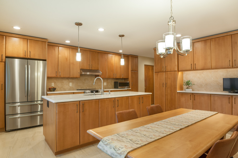 Eat-in kitchen - mid-sized contemporary l-shaped beige floor eat-in kitchen idea in Detroit with flat-panel cabinets, medium tone wood cabinets, beige backsplash, porcelain backsplash, stainless steel appliances, an island, multicolored countertops and an undermount sink
