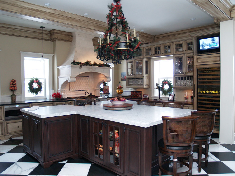 Classic kitchen in Cleveland with glass-front cabinets.
