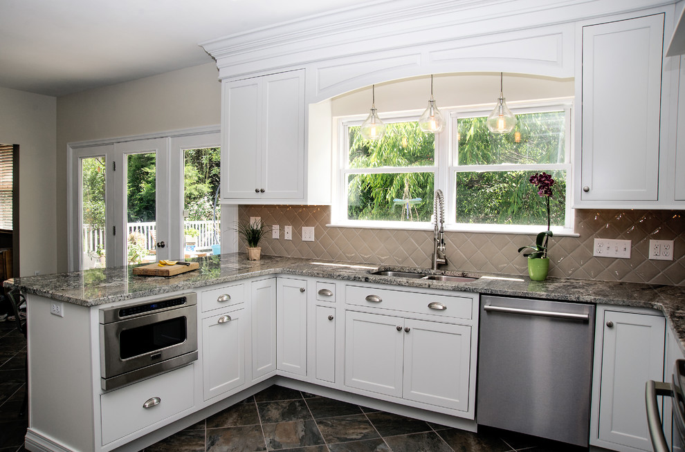 Mid-sized trendy u-shaped porcelain tile eat-in kitchen photo in Wilmington with a double-bowl sink, beaded inset cabinets, white cabinets, granite countertops, green backsplash, ceramic backsplash and stainless steel appliances