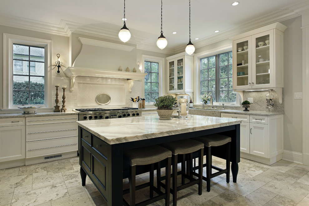 Eat-in kitchen - mid-sized modern l-shaped ceramic tile and white floor eat-in kitchen idea in Chicago with a farmhouse sink, shaker cabinets, white cabinets, quartz countertops, white backsplash, subway tile backsplash, stainless steel appliances and an island
