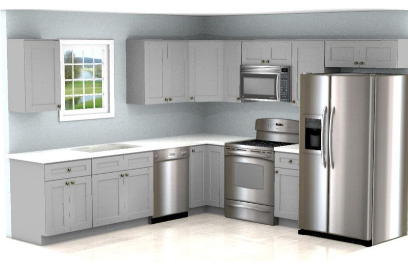 Exemple d'une cuisine américaine chic en L de taille moyenne avec un placard à porte shaker et un électroménager en acier inoxydable.