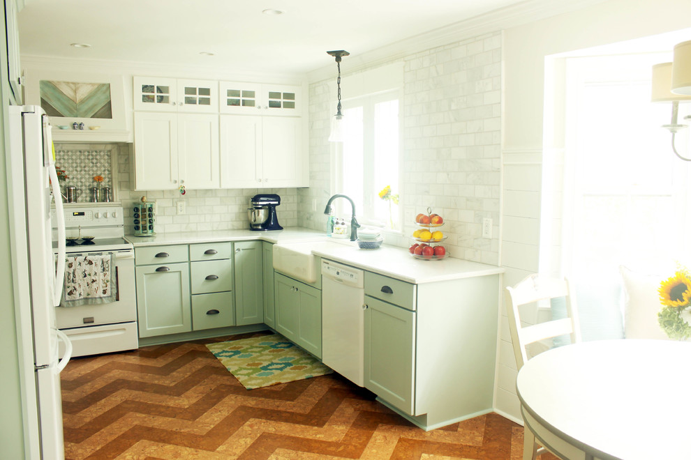 Example of a cottage l-shaped eat-in kitchen design in Raleigh with a farmhouse sink, recessed-panel cabinets, blue cabinets, quartz countertops, white backsplash, subway tile backsplash and white appliances