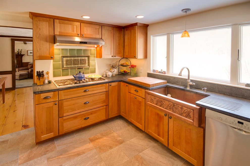 Kitchen - mid-sized transitional l-shaped medium tone wood floor and brown floor kitchen idea in Boston with a farmhouse sink, shaker cabinets, light wood cabinets, green backsplash, porcelain backsplash, stainless steel appliances and no island