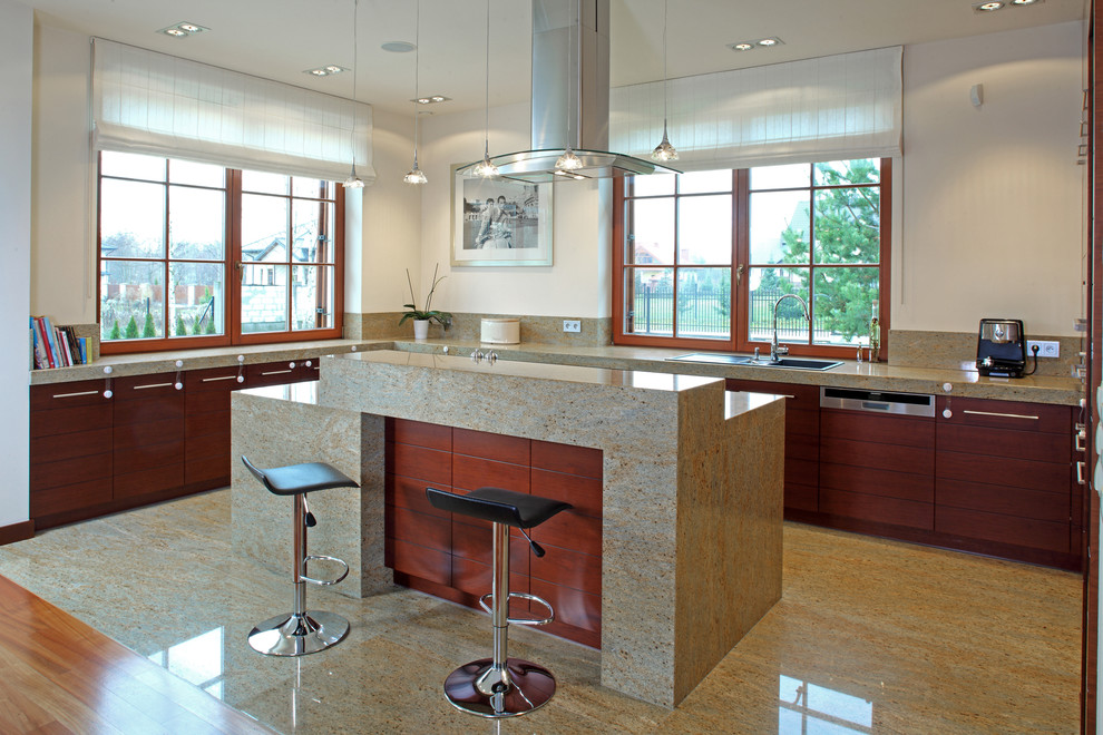 Trendy u-shaped open concept kitchen photo in Other with a drop-in sink, flat-panel cabinets and dark wood cabinets