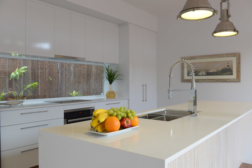 This is an example of a coastal kitchen in Gold Coast - Tweed.