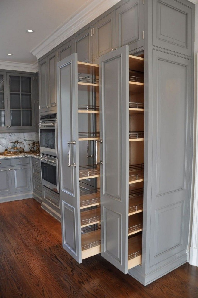 Inspiration for a classic kitchen in Columbus with raised-panel cabinets and grey cabinets.