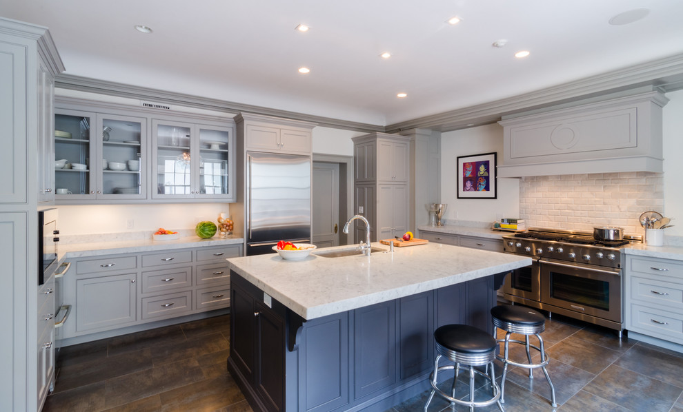 Large elegant u-shaped ceramic tile eat-in kitchen photo in Boston with an undermount sink, recessed-panel cabinets, gray cabinets, marble countertops, white backsplash, ceramic backsplash, stainless steel appliances and an island