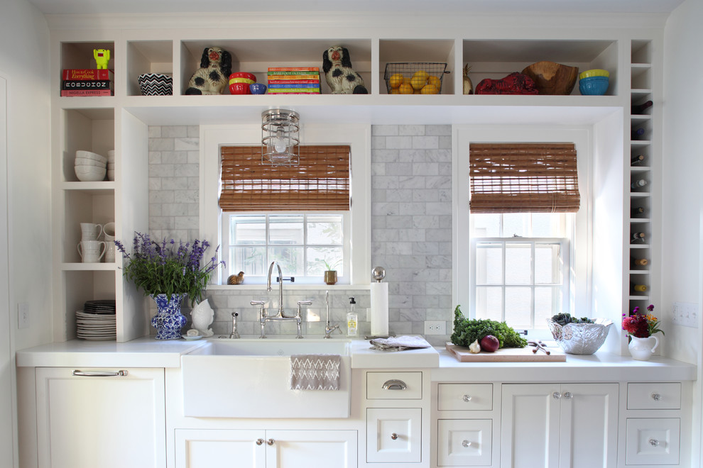 Kitchen - traditional kitchen idea in Minneapolis with a farmhouse sink, open cabinets, white cabinets, white backsplash and marble backsplash