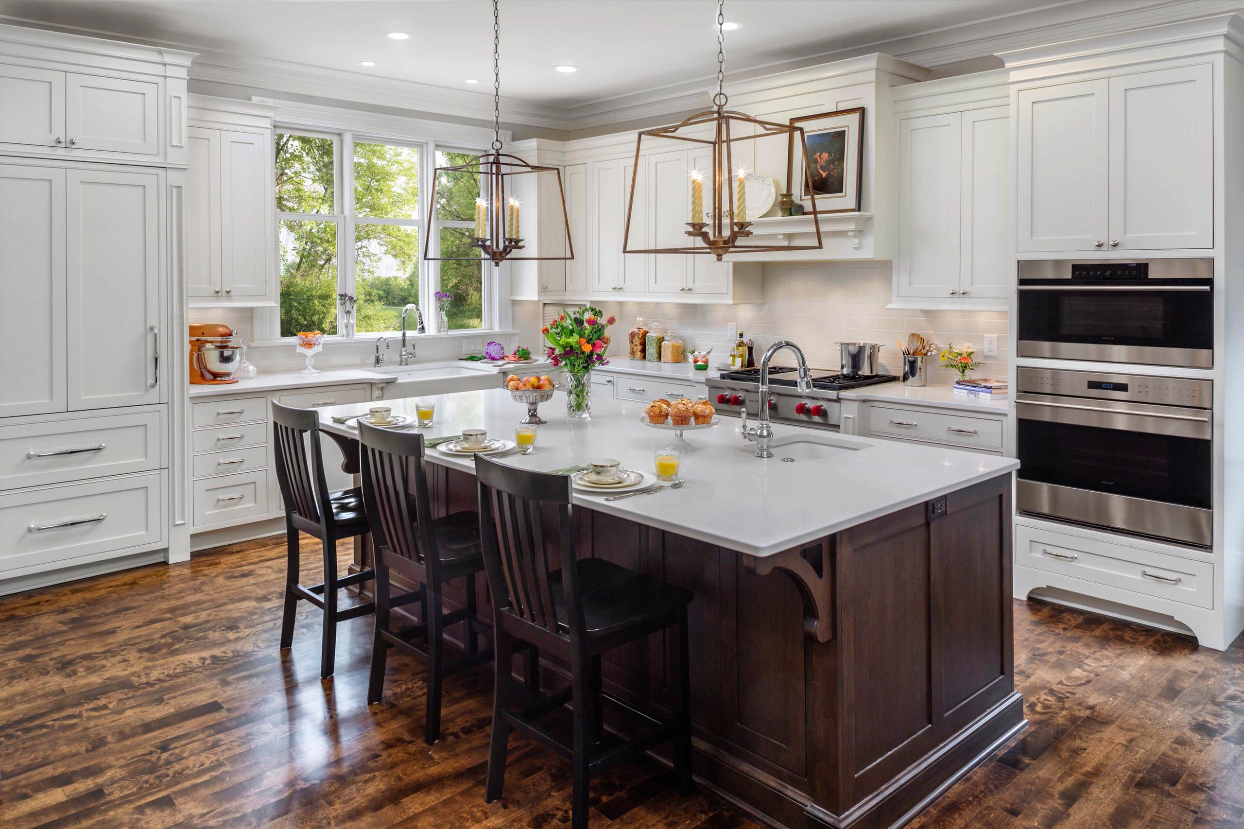 dark wood kitchen with white counters