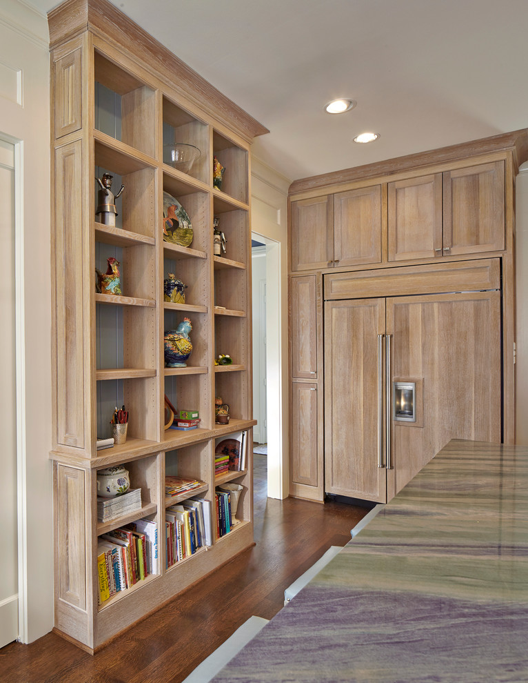 Example of a large classic l-shaped medium tone wood floor and brown floor eat-in kitchen design in Dallas with an undermount sink, beaded inset cabinets, light wood cabinets, quartzite countertops, blue backsplash, paneled appliances, an island, multicolored countertops and cement tile backsplash