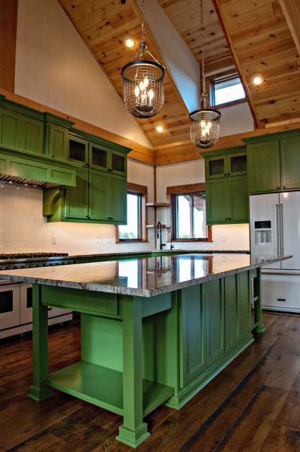 Sage green kitchen with shiplap walls in a Toronto home, Ontario