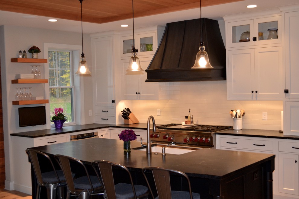 black range hood white cabinets