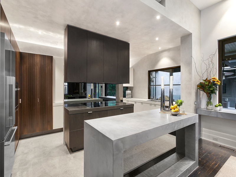 This is an example of an expansive contemporary kitchen/diner in Melbourne.