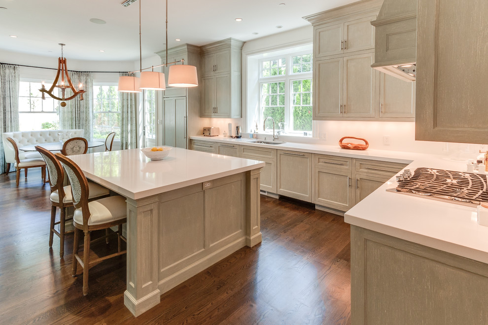 Elegant l-shaped eat-in kitchen photo in Other with an undermount sink, shaker cabinets, paneled appliances and gray cabinets