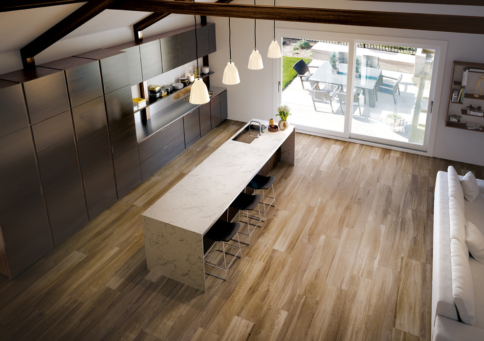 Inspiration for a medium sized kitchen/diner in New York with porcelain flooring and an island.