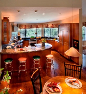 Inspiration for a mid-sized timeless galley eat-in kitchen remodel in San Francisco with recessed-panel cabinets, light wood cabinets, tile countertops, multicolored backsplash and a peninsula