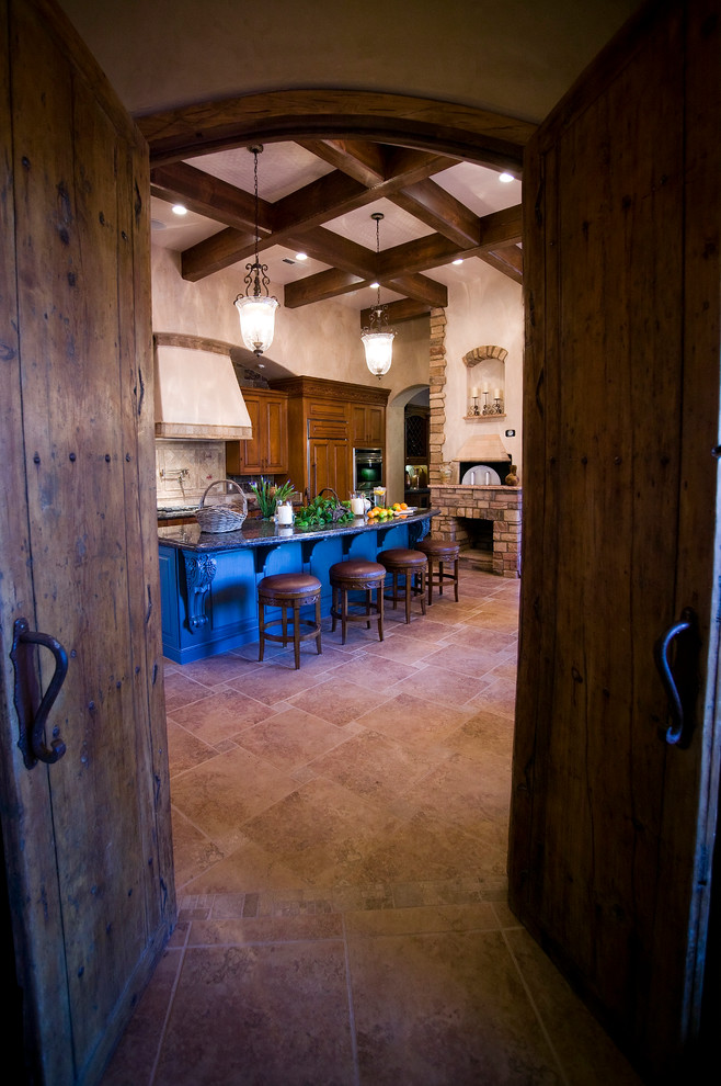 Example of a tuscan kitchen design in Albuquerque