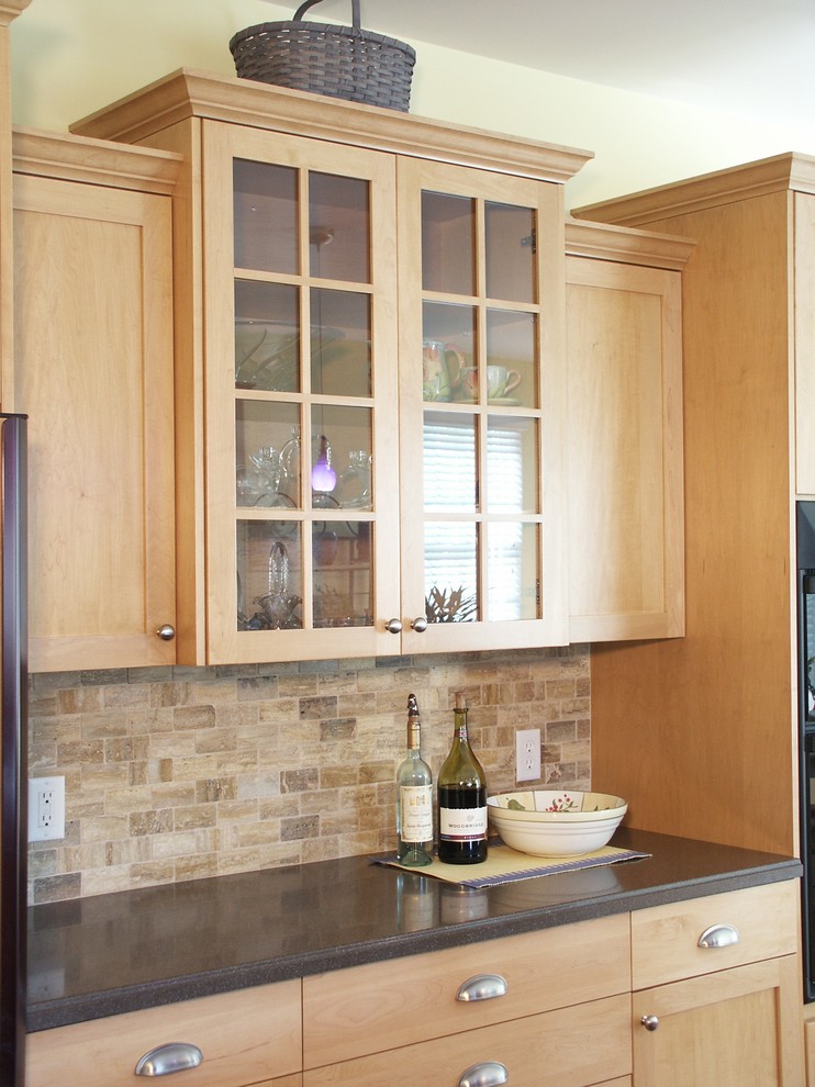 Example of a mid-sized arts and crafts galley laminate floor and brown floor eat-in kitchen design in New York with a double-bowl sink, shaker cabinets, light wood cabinets, beige backsplash, stone tile backsplash, paneled appliances and an island