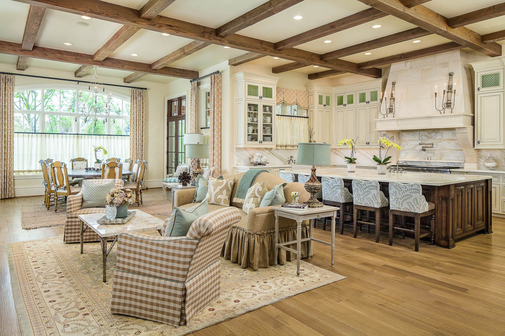 Example of a classic l-shaped open concept kitchen design in Dallas with beige backsplash and stainless steel appliances