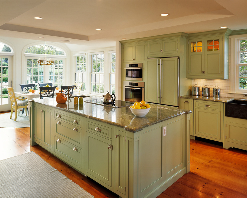 Example of a classic kitchen design in Boston with subway tile backsplash