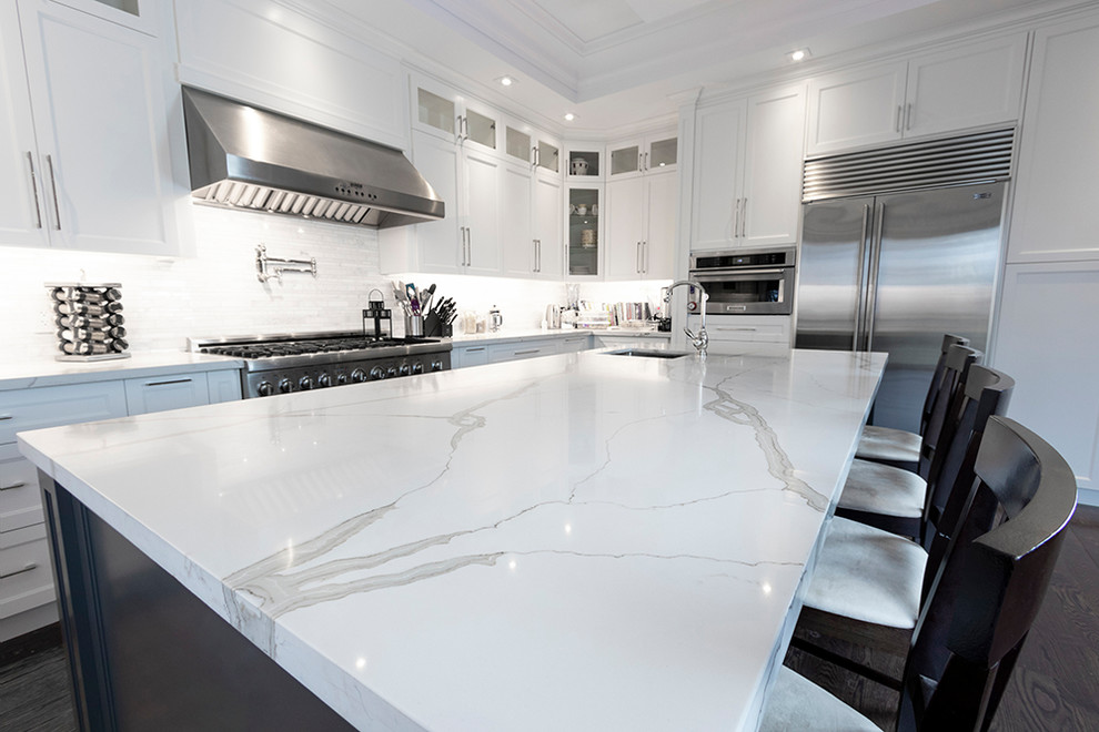 Design ideas for a modern kitchen in Toronto with engineered stone countertops.