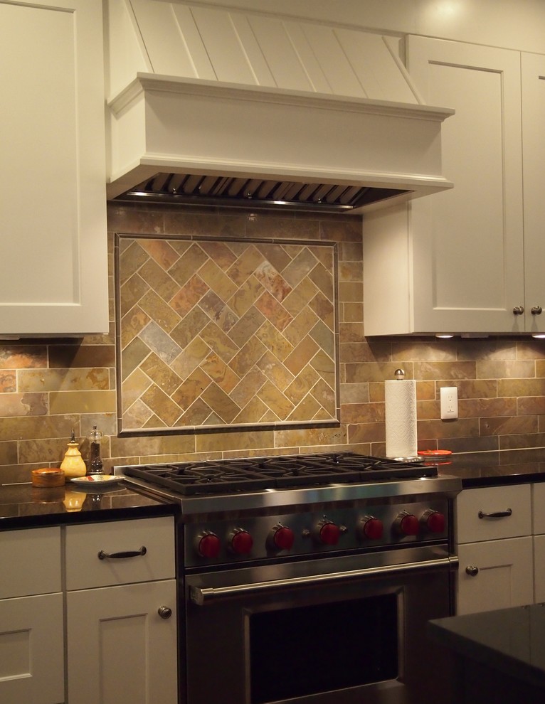 Example of an arts and crafts kitchen design in Grand Rapids
