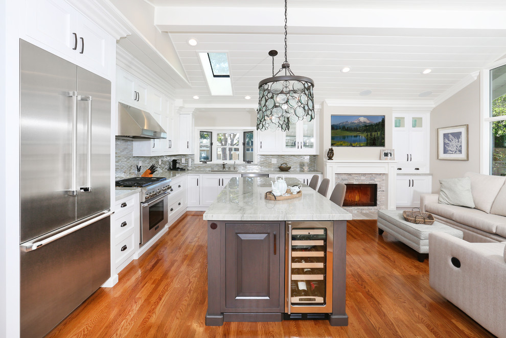 Design ideas for a traditional l-shaped open plan kitchen in Orange County with an island.