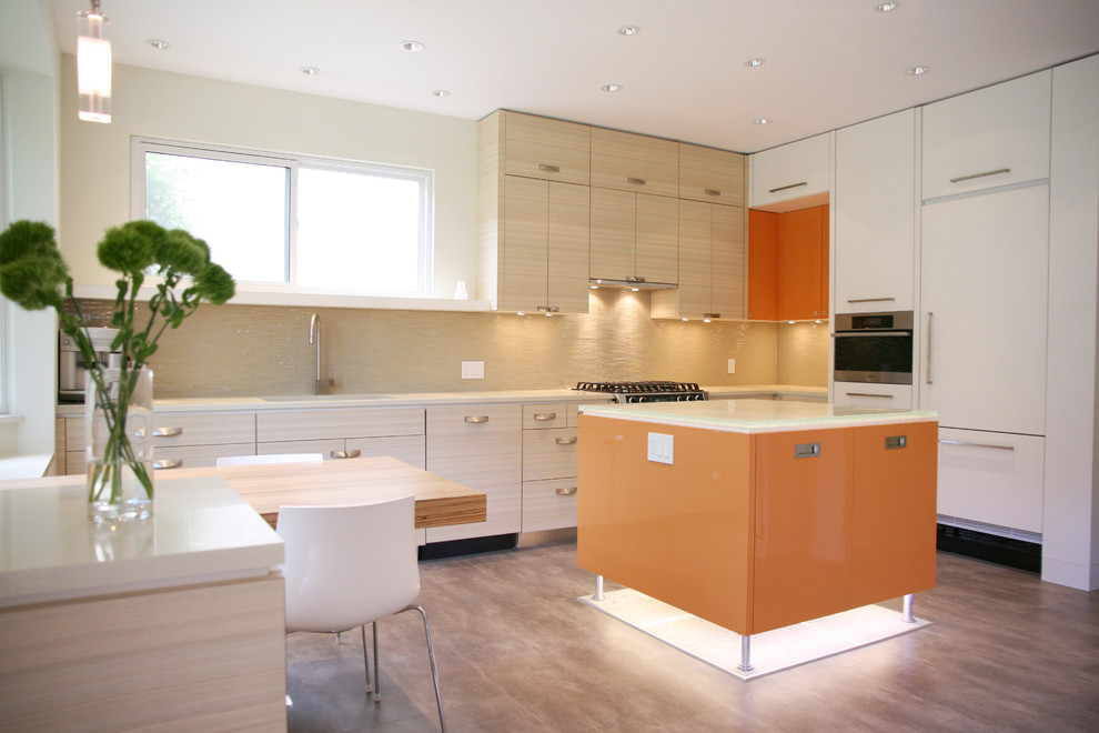 Photo of a contemporary kitchen in Vancouver with integrated appliances.