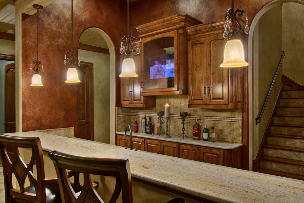 Example of a mountain style kitchen design in Austin with raised-panel cabinets and medium tone wood cabinets