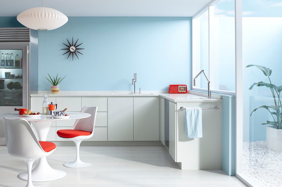 Photo of a contemporary kitchen/diner in Boston with a submerged sink, flat-panel cabinets, white cabinets, blue splashback, painted wood flooring and no island.