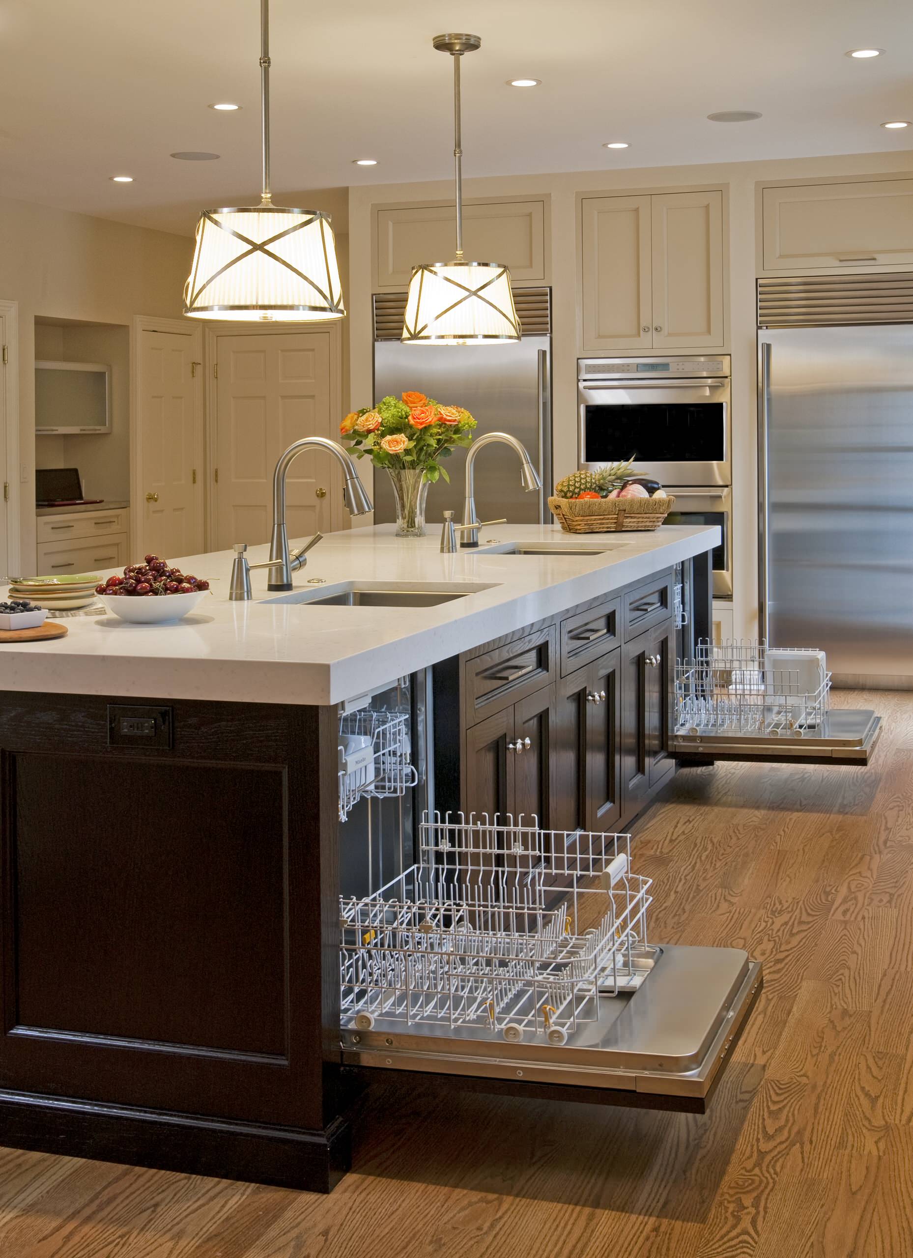 kitchen island with dishwasher and seating