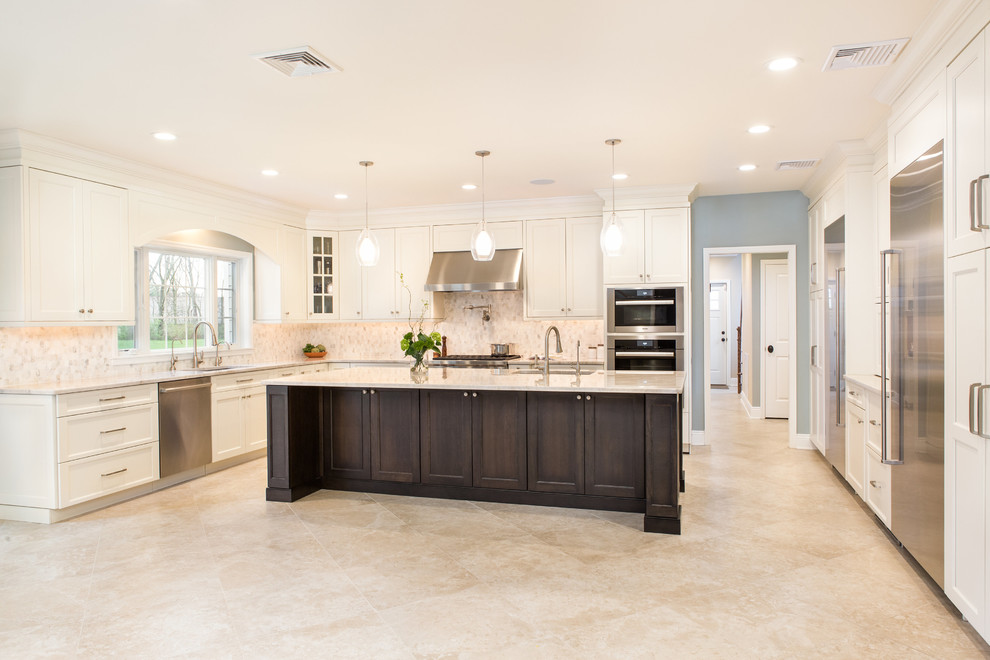 Large transitional beige floor eat-in kitchen photo in New York with an undermount sink, flat-panel cabinets, white cabinets, quartzite countertops, white backsplash, marble backsplash, stainless steel appliances, an island and beige countertops