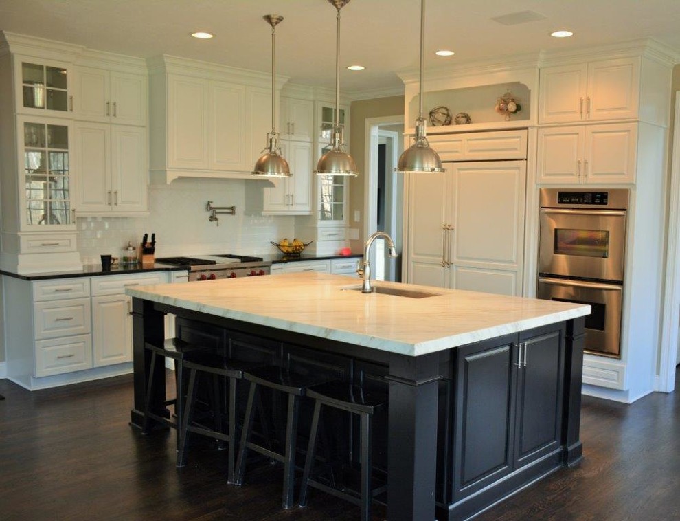 Kitchen - transitional l-shaped kitchen idea in Indianapolis with an island