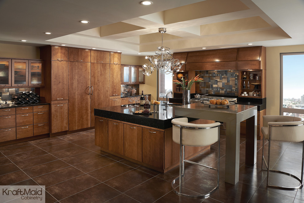 Immagine di una grande cucina design con ante lisce, ante in legno scuro, top in granito, paraspruzzi multicolore e elettrodomestici in acciaio inossidabile