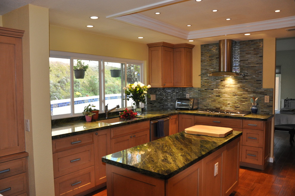 Example of a trendy kitchen design in San Diego with green countertops