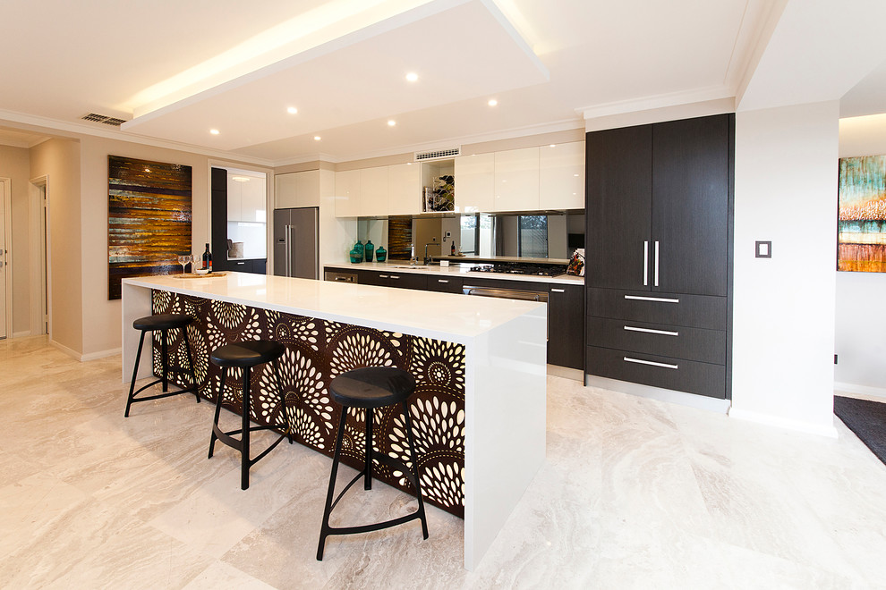 Inspiration for a contemporary single-wall open plan kitchen in Perth with flat-panel cabinets, dark wood cabinets, mirror splashback, stainless steel appliances and beige floors.