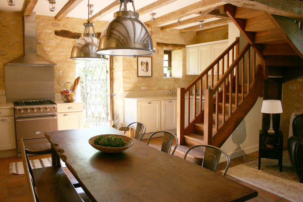 French country kitchen photo in Seattle with stainless steel appliances