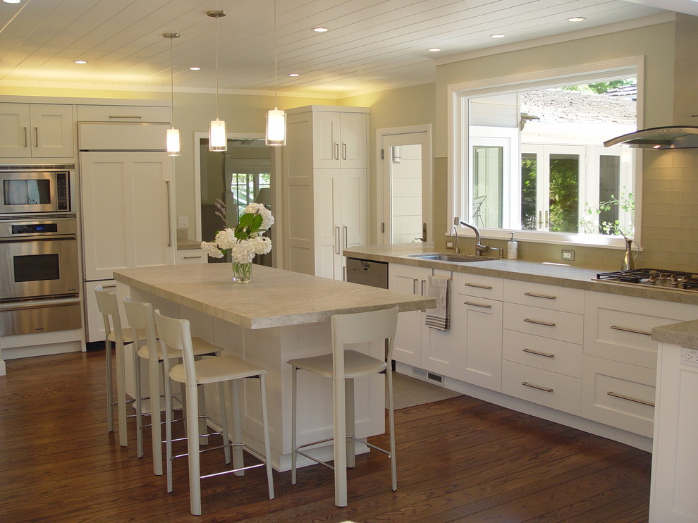 Kitchen - traditional kitchen idea in San Francisco with an undermount sink and white cabinets