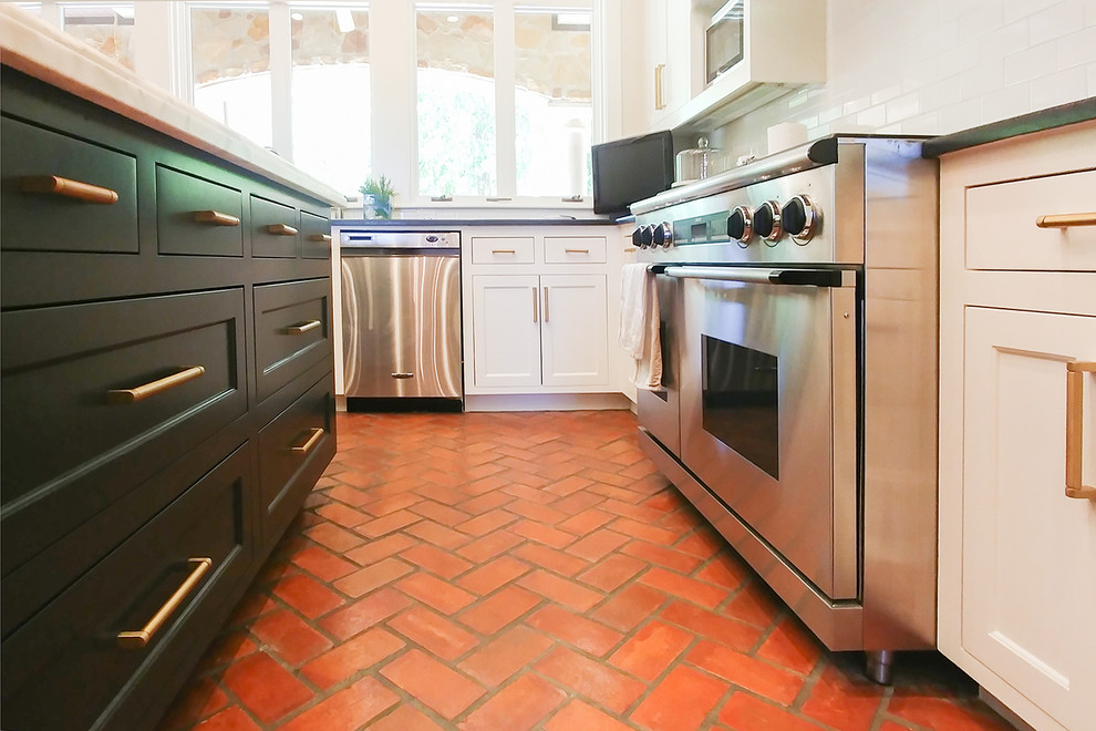 Lake Austin Kitchen with White Cabinets, Black Island ...