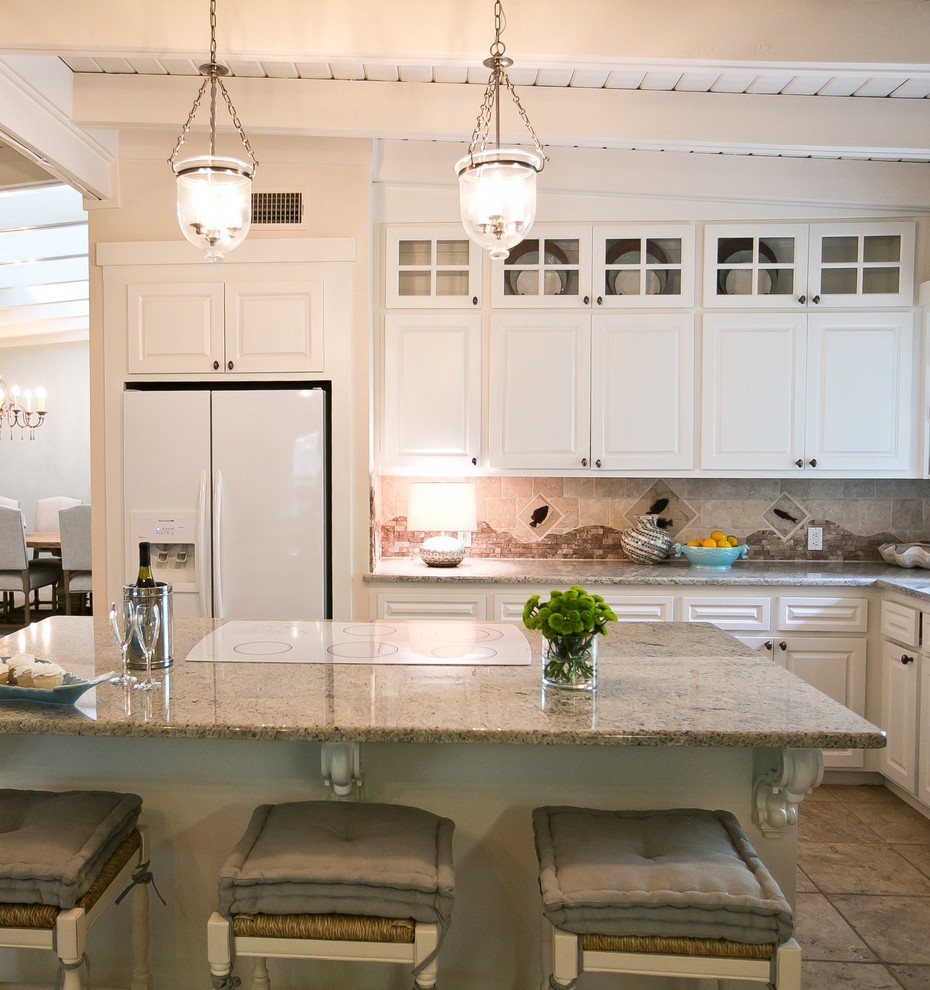 This is an example of a beach style kitchen in Austin.