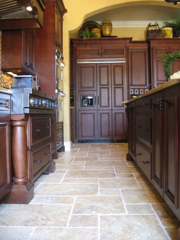 Example of a tuscan kitchen design in Orlando